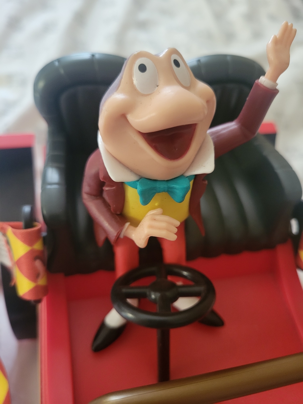 Disney Frog Character in Red Car with Teal Bow Tie and Yellow Vest